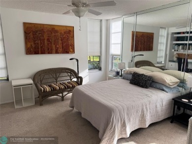 Convenient first floor unit condo in the tropical Palm Aire on Palm-Aire Country Club and Resort - The Oaks in Florida - for sale on GolfHomes.com, golf home, golf lot