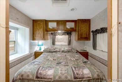 Cozy and character-filled nestled in a quiet lake community just on River Ridge Golf Club in Virginia - for sale on GolfHomes.com, golf home, golf lot