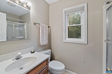 Step inside this one-level 3 bedroom, 2.5 bath Mid-Century on Lake Monticello Golf Course in Virginia - for sale on GolfHomes.com, golf home, golf lot