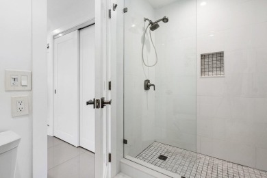 Welcome to this beautifully updated second-floor residence on Quail Ridge Golf Course and Country Club in Florida - for sale on GolfHomes.com, golf home, golf lot