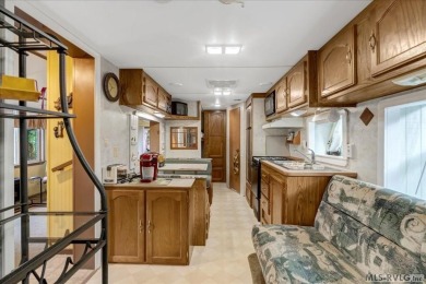 Cozy and character-filled nestled in a quiet lake community just on River Ridge Golf Club in Virginia - for sale on GolfHomes.com, golf home, golf lot
