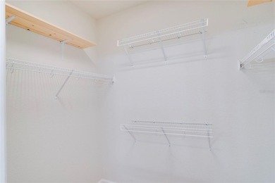 One or more photo(s) has been virtually staged. Experience on ChampionsGate Golf Resort in Florida - for sale on GolfHomes.com, golf home, golf lot