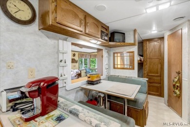 Cozy and character-filled nestled in a quiet lake community just on River Ridge Golf Club in Virginia - for sale on GolfHomes.com, golf home, golf lot