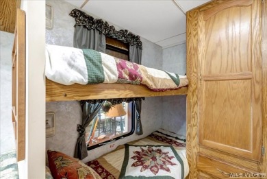 Cozy and character-filled nestled in a quiet lake community just on River Ridge Golf Club in Virginia - for sale on GolfHomes.com, golf home, golf lot