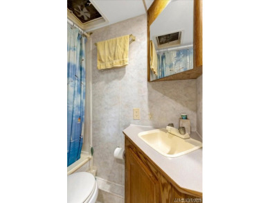 Cozy and character-filled nestled in a quiet lake community just on River Ridge Golf Club in Virginia - for sale on GolfHomes.com, golf home, golf lot