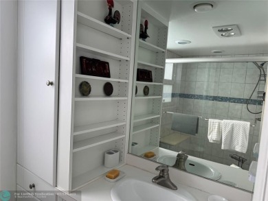 Convenient first floor unit condo in the tropical Palm Aire on Palm-Aire Country Club and Resort - The Oaks in Florida - for sale on GolfHomes.com, golf home, golf lot