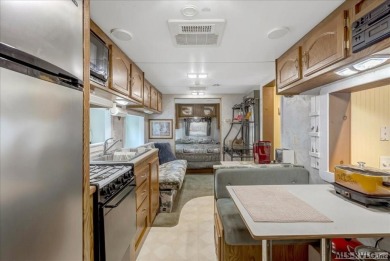 Cozy and character-filled nestled in a quiet lake community just on River Ridge Golf Club in Virginia - for sale on GolfHomes.com, golf home, golf lot