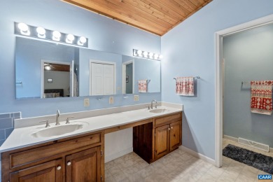 Step inside this one-level 3 bedroom, 2.5 bath Mid-Century on Lake Monticello Golf Course in Virginia - for sale on GolfHomes.com, golf home, golf lot