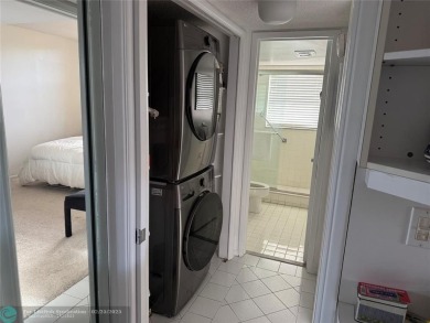 Convenient first floor unit condo in the tropical Palm Aire on Palm-Aire Country Club and Resort - The Oaks in Florida - for sale on GolfHomes.com, golf home, golf lot
