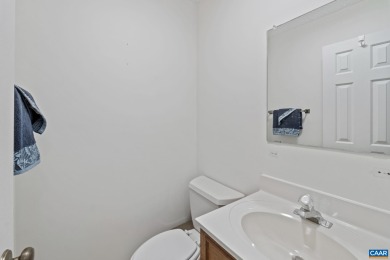Step inside this one-level 3 bedroom, 2.5 bath Mid-Century on Lake Monticello Golf Course in Virginia - for sale on GolfHomes.com, golf home, golf lot