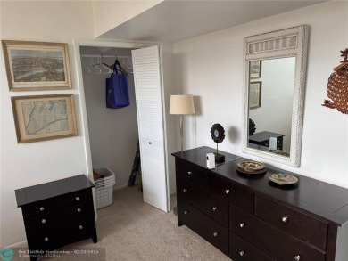 Convenient first floor unit condo in the tropical Palm Aire on Palm-Aire Country Club and Resort - The Oaks in Florida - for sale on GolfHomes.com, golf home, golf lot