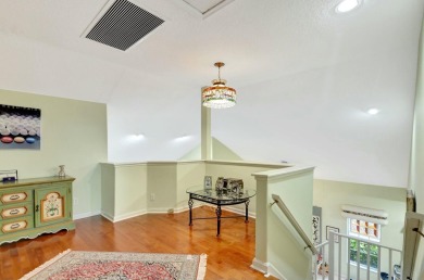 Immaculate Large End Unit Townhome in Highly Sought After on PGA National Golf Club in Florida - for sale on GolfHomes.com, golf home, golf lot