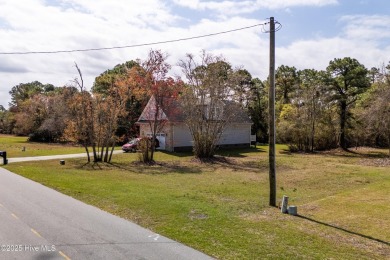 Discover the perfect space to bring your creative vision to on Harbour Point Golf Club in North Carolina - for sale on GolfHomes.com, golf home, golf lot