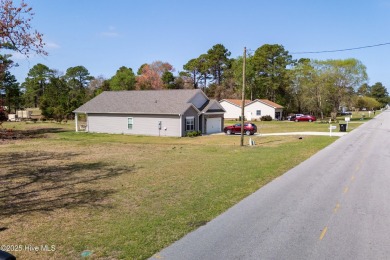 Discover the perfect space to bring your creative vision to on Harbour Point Golf Club in North Carolina - for sale on GolfHomes.com, golf home, golf lot