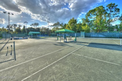 Welcome to this charming, light-filled condo in the highly on Spruce Creek Golf Club in Florida - for sale on GolfHomes.com, golf home, golf lot