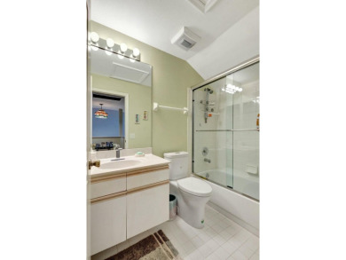 Immaculate Large End Unit Townhome in Highly Sought After on PGA National Golf Club in Florida - for sale on GolfHomes.com, golf home, golf lot