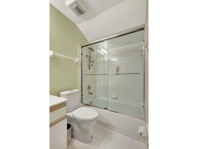 Immaculate Large End Unit Townhome in Highly Sought After on PGA National Golf Club in Florida - for sale on GolfHomes.com, golf home, golf lot