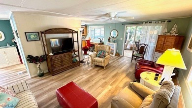 This stunning manufactured home boasts 2 bedrooms and 2 on Riverbend Golf and Country Club in Florida - for sale on GolfHomes.com, golf home, golf lot