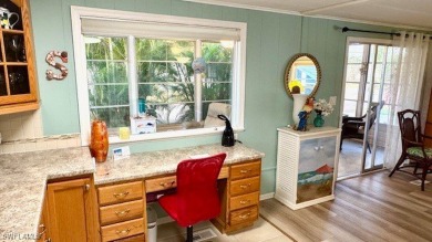 This stunning manufactured home boasts 2 bedrooms and 2 on Riverbend Golf and Country Club in Florida - for sale on GolfHomes.com, golf home, golf lot