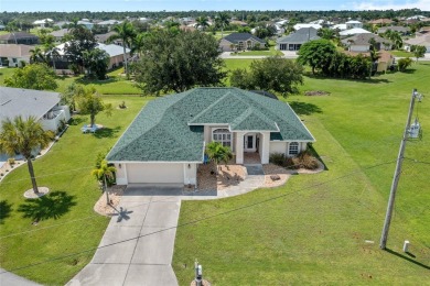 Impeccably remodeled 3-bedroom, 2-bath, 2-car garage pool home on Seminole Lakes Country Club in Florida - for sale on GolfHomes.com, golf home, golf lot