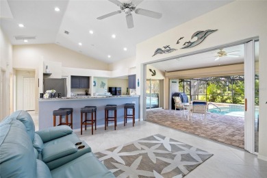 Impeccably remodeled 3-bedroom, 2-bath, 2-car garage pool home on Seminole Lakes Country Club in Florida - for sale on GolfHomes.com, golf home, golf lot