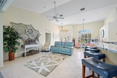 Impeccably remodeled 3-bedroom, 2-bath, 2-car garage pool home on Seminole Lakes Country Club in Florida - for sale on GolfHomes.com, golf home, golf lot