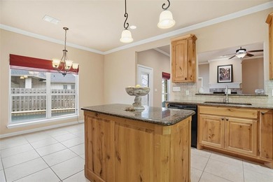 Nestled in a highly desirable gated community offering on Pecan Plantation Country Club in Texas - for sale on GolfHomes.com, golf home, golf lot