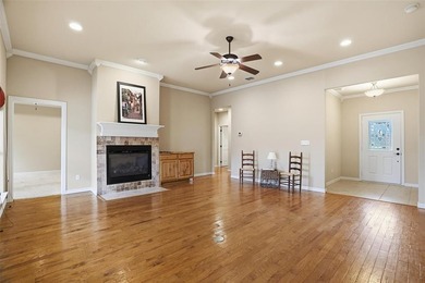 Nestled in a highly desirable gated community offering on Pecan Plantation Country Club in Texas - for sale on GolfHomes.com, golf home, golf lot