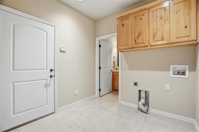 Nestled in a highly desirable gated community offering on Pecan Plantation Country Club in Texas - for sale on GolfHomes.com, golf home, golf lot