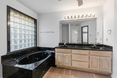 This spacious home features a fresh interior paint job and on De Cordova Bend Country Club in Texas - for sale on GolfHomes.com, golf home, golf lot