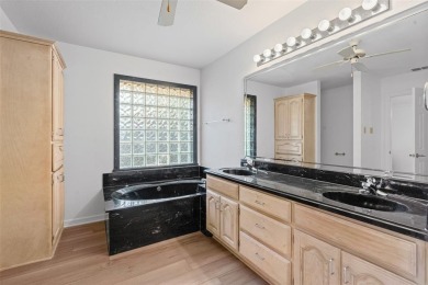 This spacious home features a fresh interior paint job and on De Cordova Bend Country Club in Texas - for sale on GolfHomes.com, golf home, golf lot