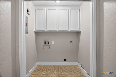 Welcome to 107 Cherry Hills Drive, located in the beautiful on Rockport Country Club in Texas - for sale on GolfHomes.com, golf home, golf lot