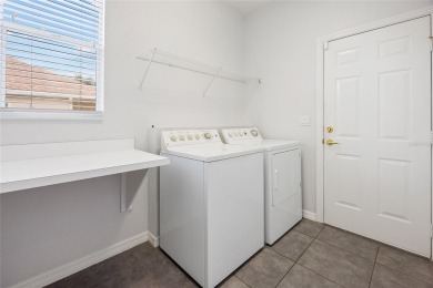 Located on the Masters Golf Course in the sought-after Windward on Eagle Ridge At Spruce Creek Country Club in Florida - for sale on GolfHomes.com, golf home, golf lot