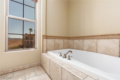 Indulge in Tuscan-inspired luxury at this Lake Las Vegas condo on Reflection Bay Golf Club in Nevada - for sale on GolfHomes.com, golf home, golf lot