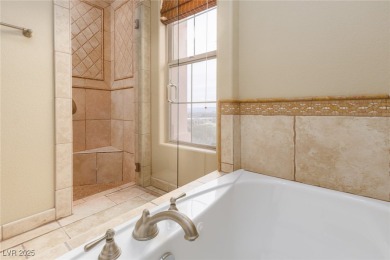 Indulge in Tuscan-inspired luxury at this Lake Las Vegas condo on Reflection Bay Golf Club in Nevada - for sale on GolfHomes.com, golf home, golf lot