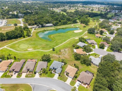 Located on the Masters Golf Course in the sought-after Windward on Eagle Ridge At Spruce Creek Country Club in Florida - for sale on GolfHomes.com, golf home, golf lot