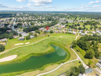 Located on the Masters Golf Course in the sought-after Windward on Eagle Ridge At Spruce Creek Country Club in Florida - for sale on GolfHomes.com, golf home, golf lot
