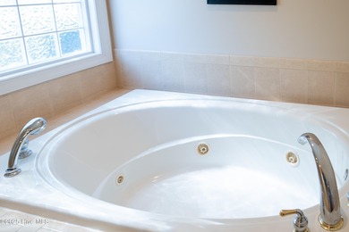 Exceptional custom home by Firetti Builders, impeccably on Members Club At St. James Plantation in North Carolina - for sale on GolfHomes.com, golf home, golf lot