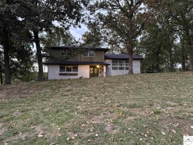 Don't miss out on this opportunity to purchase a two-owner on Triple Creek Golf Course in Missouri - for sale on GolfHomes.com, golf home, golf lot