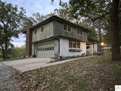 Don't miss out on this opportunity to purchase a two-owner on Triple Creek Golf Course in Missouri - for sale on GolfHomes.com, golf home, golf lot