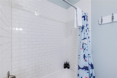 Short walk to the beach! In-town, golf-cart accessible 3-story on Palmilla Beach Golf Club in Texas - for sale on GolfHomes.com, golf home, golf lot