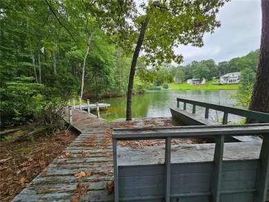 This 3 bed, 2 bath single-story home sits on the smaller fishing on Fairfield Plantation Golf and Country Club in Georgia - for sale on GolfHomes.com, golf home, golf lot