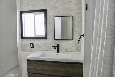 Beautifully updated and move-in ready, this 2-bedroom, 2-bath on Colonial Country Club in California - for sale on GolfHomes.com, golf home, golf lot