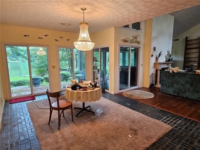 This 3 bed, 2 bath single-story home sits on the smaller fishing on Fairfield Plantation Golf and Country Club in Georgia - for sale on GolfHomes.com, golf home, golf lot