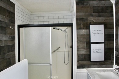 Beautifully updated and move-in ready, this 2-bedroom, 2-bath on Colonial Country Club in California - for sale on GolfHomes.com, golf home, golf lot