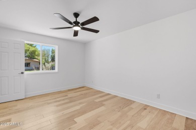 This move-in ready home features fresh paint inside & out and on Bellaire Golf Club in Arizona - for sale on GolfHomes.com, golf home, golf lot