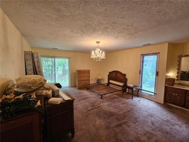 This 3 bed, 2 bath single-story home sits on the smaller fishing on Fairfield Plantation Golf and Country Club in Georgia - for sale on GolfHomes.com, golf home, golf lot