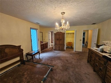 This 3 bed, 2 bath single-story home sits on the smaller fishing on Fairfield Plantation Golf and Country Club in Georgia - for sale on GolfHomes.com, golf home, golf lot