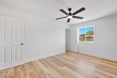 This move-in ready home features fresh paint inside & out and on Bellaire Golf Club in Arizona - for sale on GolfHomes.com, golf home, golf lot