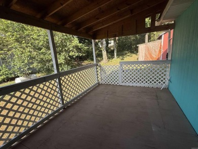 Welcome to 403 Pavilion Ln in Horseshoe Bend--your peaceful on The Course At Turkey Mountain in Arkansas - for sale on GolfHomes.com, golf home, golf lot